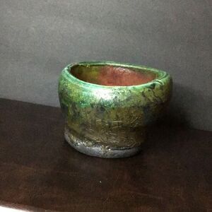 Cup or bowl by T. P.